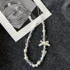 Stylish Floral Pearl Beaded Phone Lanyard for Women – Light Luxury, High-End Feel, Anti-Lost Chain
