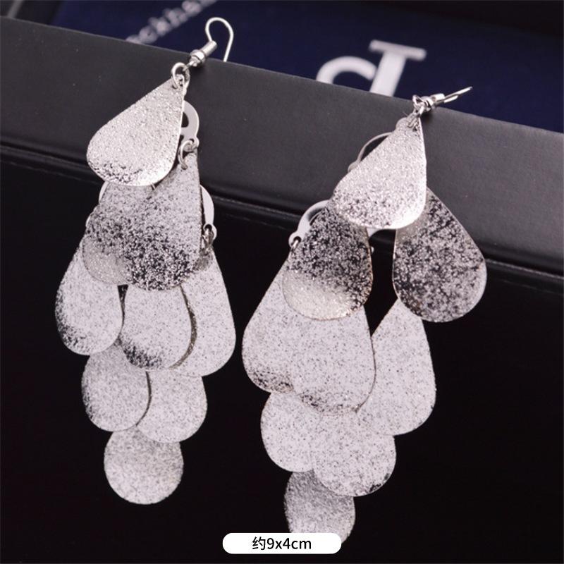 Fashion exaggerated niche temperament fringed earrings retro personality versatile sequined earrings women's long ear jewelry