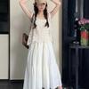 Trendy White Hollow Camisole Dress Set: Flattering Two-Piece Layered Vest & Dress