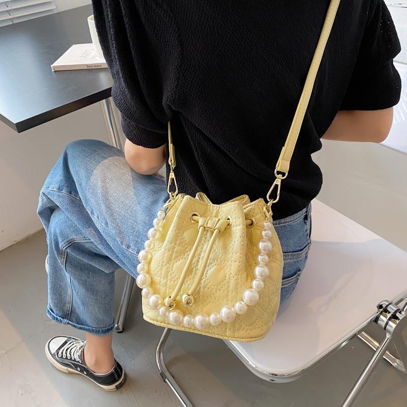 Niche pearl spring and summer bag women's new women's shoulder messenger bag embroidery thread bucket bag tide