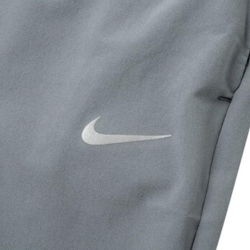Nike Women's Dri-FIT Fast Mid-Rise 7/8 Tapered Running Pants Smoke Grey FB7030-084