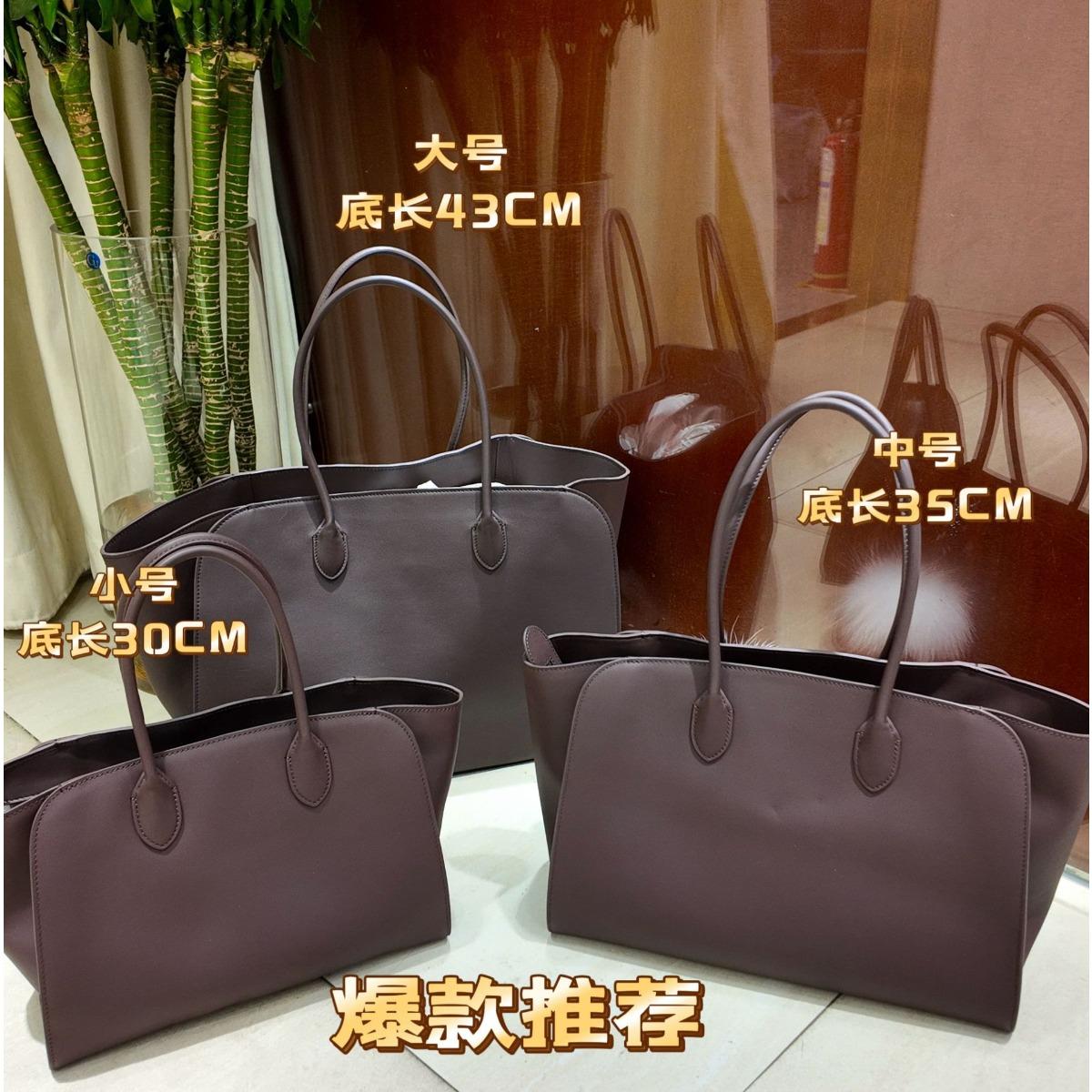 

Cross-border minimalist wind large capacity tote bag first layer cowhide handbag commuter leather shoulder women s bag factory wholesale Small size: 30.5*13cm*21.5cm