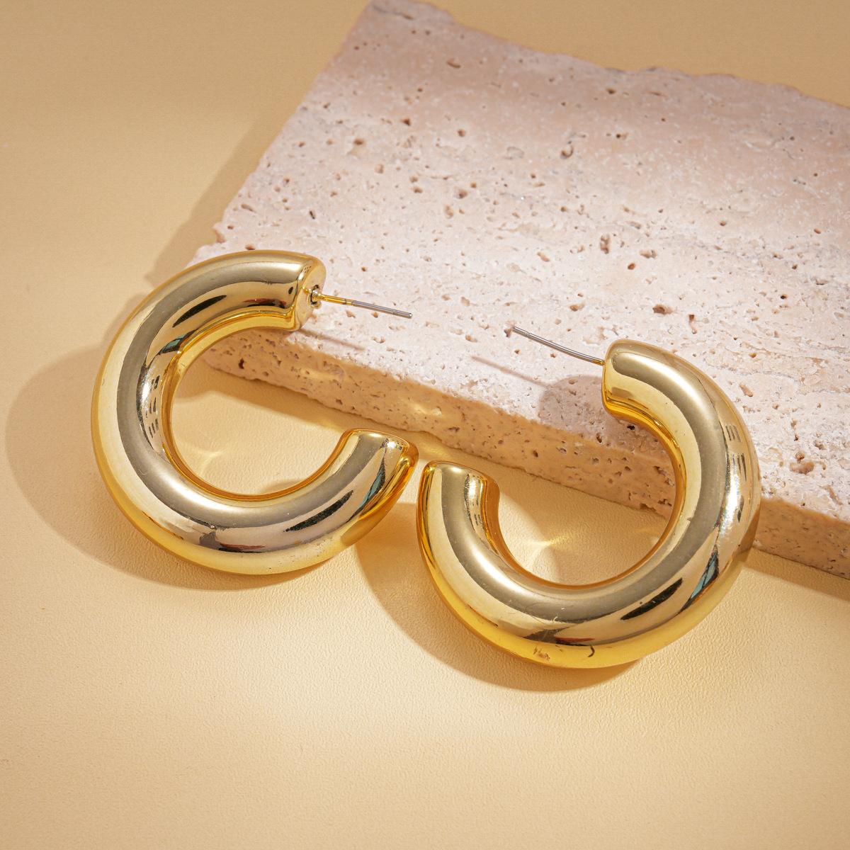 

Metallic multi-layer geometric round silver needle earrings cold wind personalized earrings