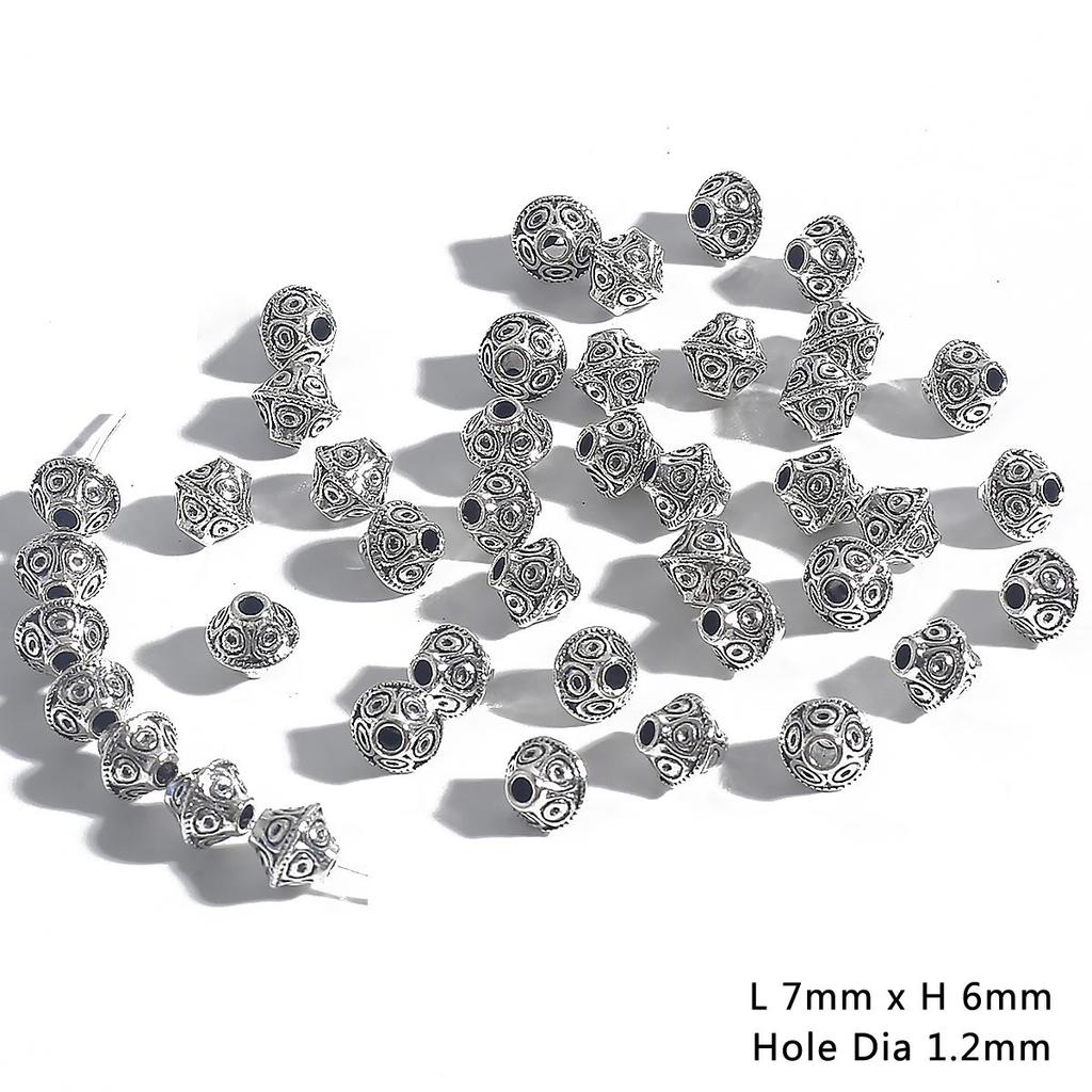 30–50 stk. avstandsperler i antikk metall med kjeglemønster til smykkelaging