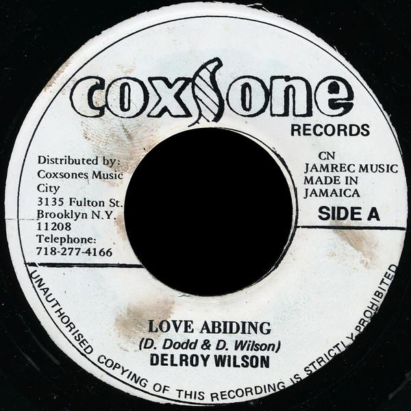 

7-дюймовая пластинка DELROY WILSON / JACKIE OPEL - Love Abiding / Solid Rock НЕТ Coxsone Records Ямайка Регги, Ска и Даб Б/У
