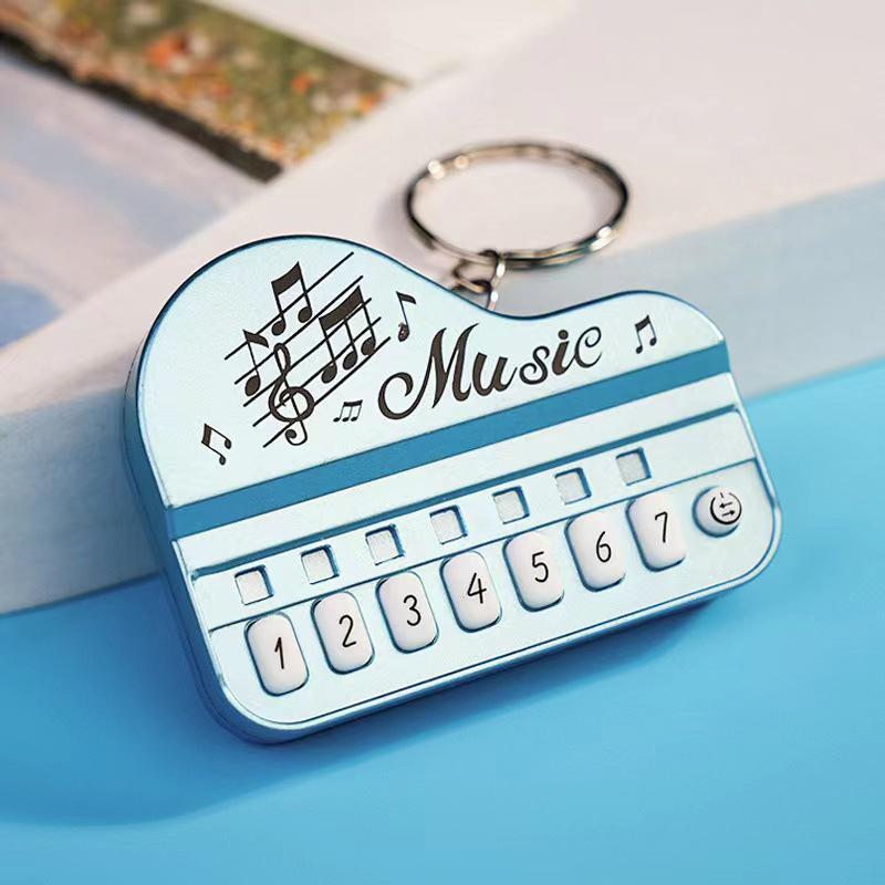 

1Pc Portable Mini Creative Music Electronic Piano Keyboard Keychain Ring With Light Up Keys Pendant Children S Toy Gaming Player A4