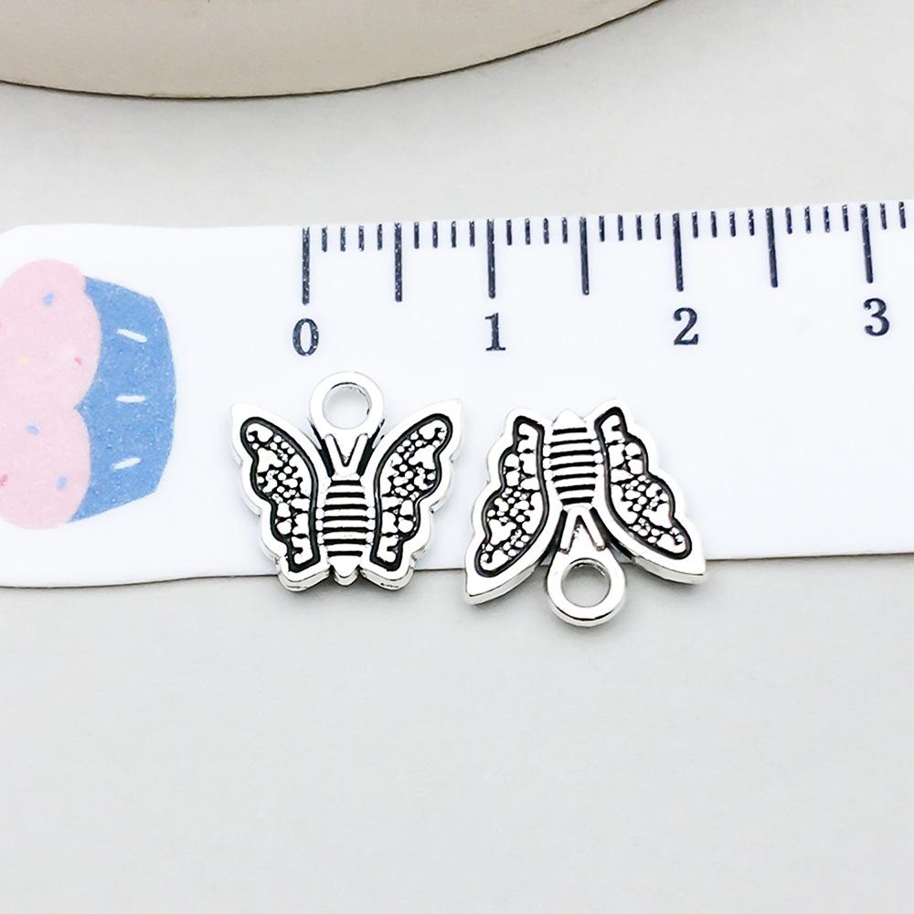 Set di 100 Ciondoli Gatto Farfalla Luna Argento Antico per Braccialetti e Collane Fai da Te
