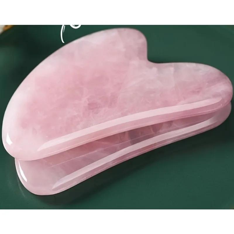 High-quality natural rose quartz heart-shaped massage tool, a soothing and smooth facial and body gua sha board for couples