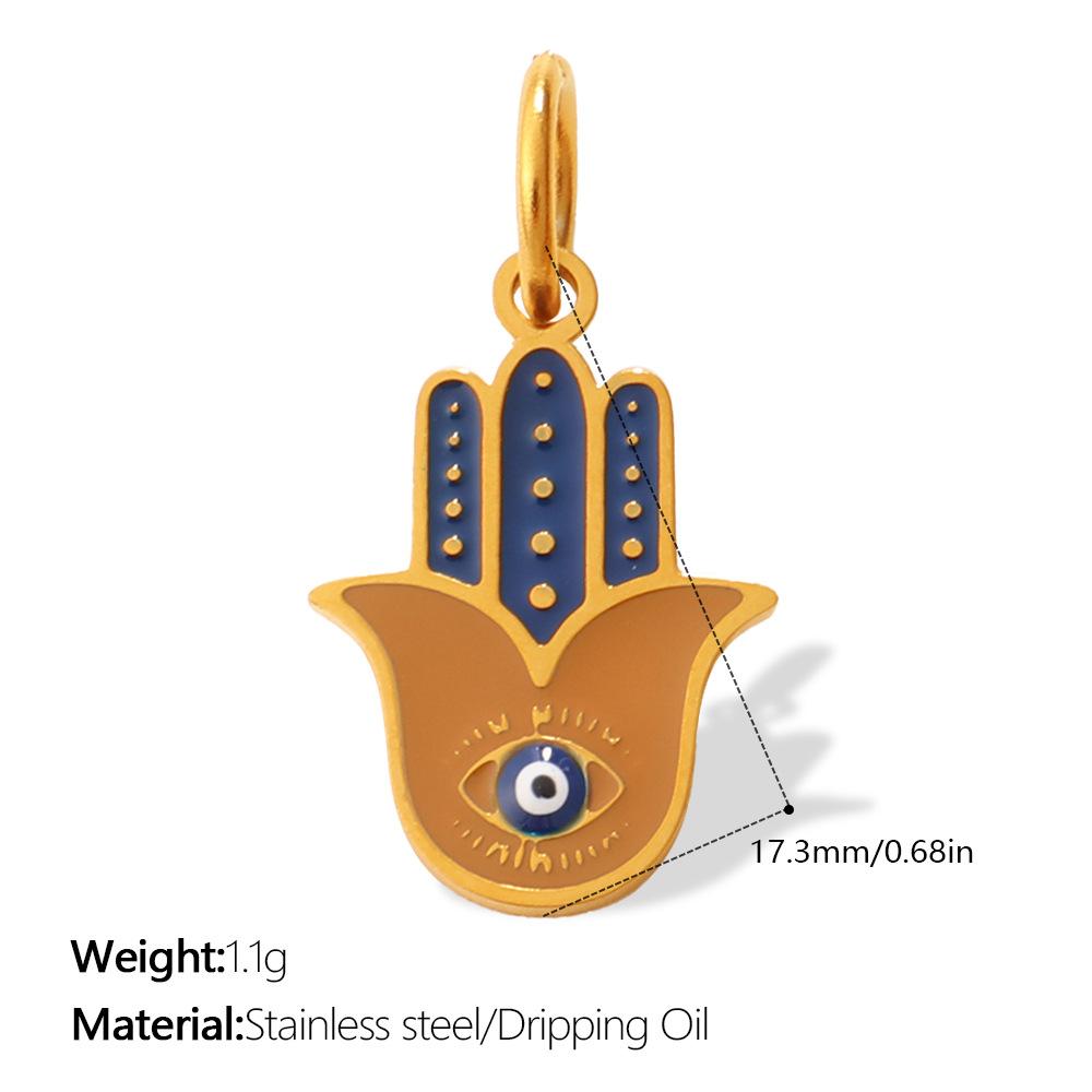 European and American retro exotic jewelry pendant golden Fatima hand evil eye element decorative pendant