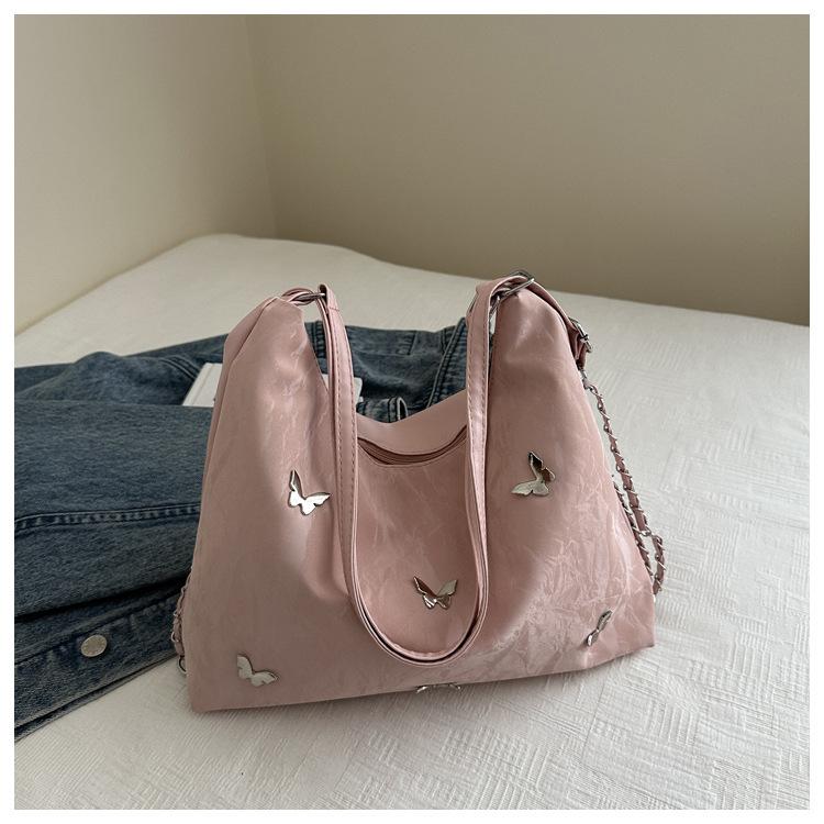 

Повседневный большой вместимости бабочка 2025 новый зарубежный стиль мода для поездок на работу многофункциональная функция сумка-тоут на одно плечо рюкзак розовый