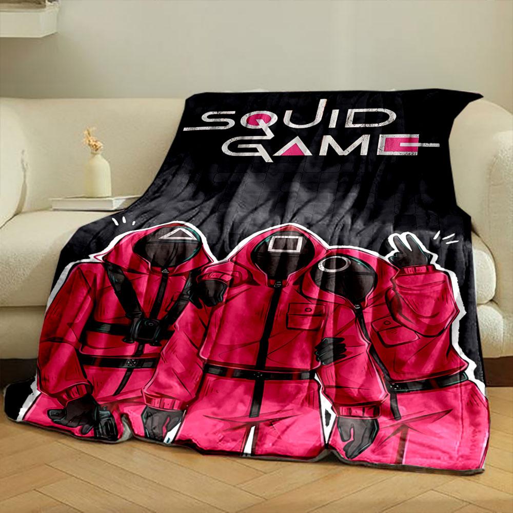 Red hooded figures with geometric masks on a dark tiled background. for all seasons blanket lunch break throw gift