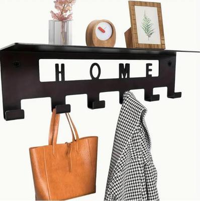 Wandmontierte schwarze Metall-Garderobe mit Regal und 6 Haken