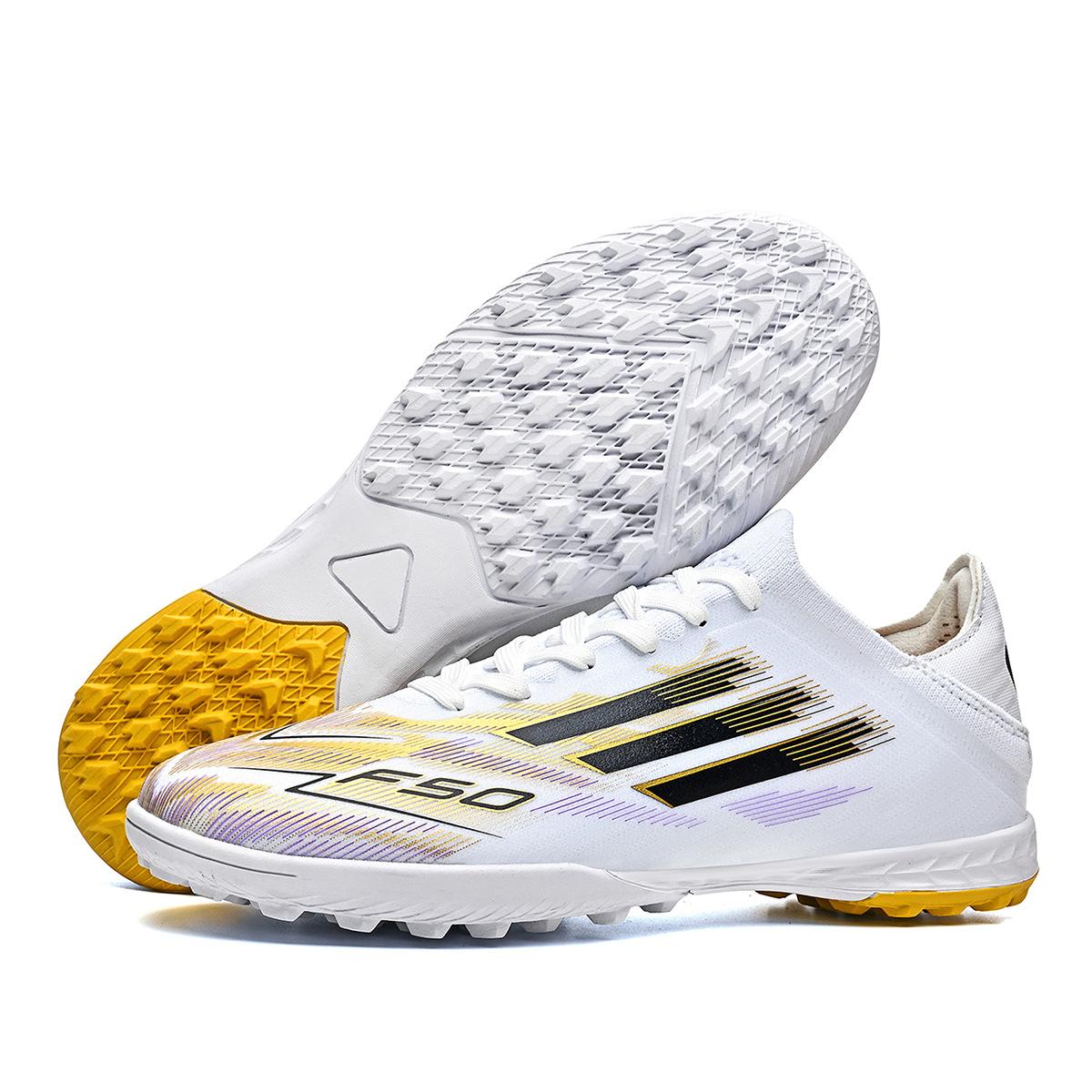 F low-top football shoes, youth grass