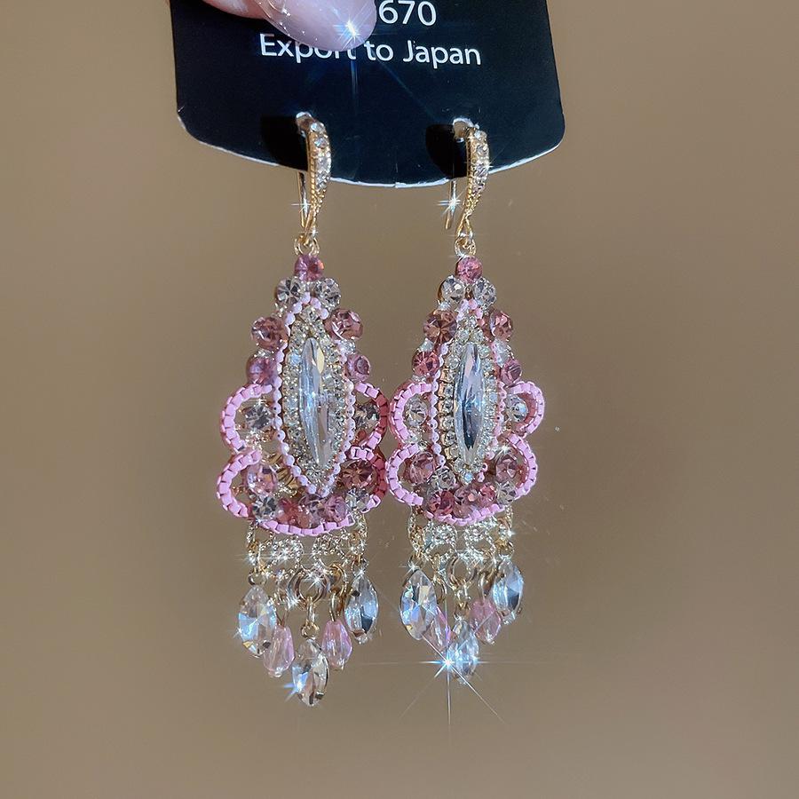 

Изысканные серьги-цветы Серебряные иглы с бриллиантами