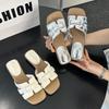 Woven one-word slippers 2025 summer new French slippers wear flat-bottomed thick heels sandals casual versatile slippers