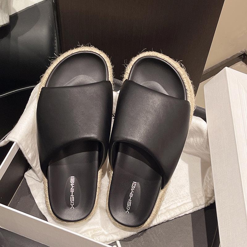 Summer vacation style straw woven thick bottom slope heel round head one and a half word drag versatile outside wearing open toe cool slippers women