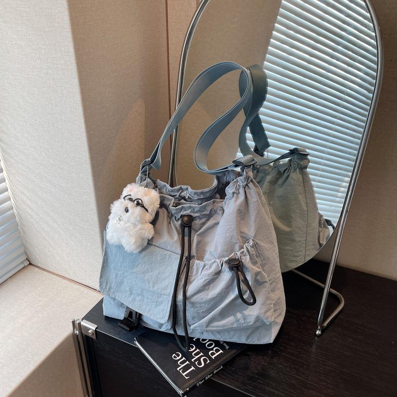 Cloth bag women's large-capacity new summer leisure niche drawstring single shoulder crossbody commuter tote bag