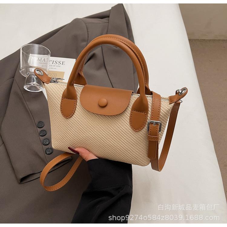 

Premium sense small bag women s 2025 spring simple fashion portable niche design bucket bag versatile single shoulder oblique span bag