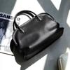 Niche design retro cowhide fashion shell handbag versatile new leather large-capacity shoulder handbag