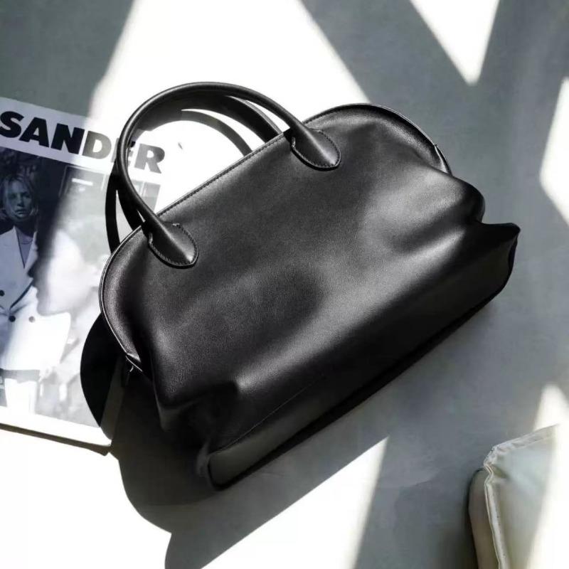 Niche design retro cowhide fashion shell handbag versatile new leather large-capacity shoulder handbag