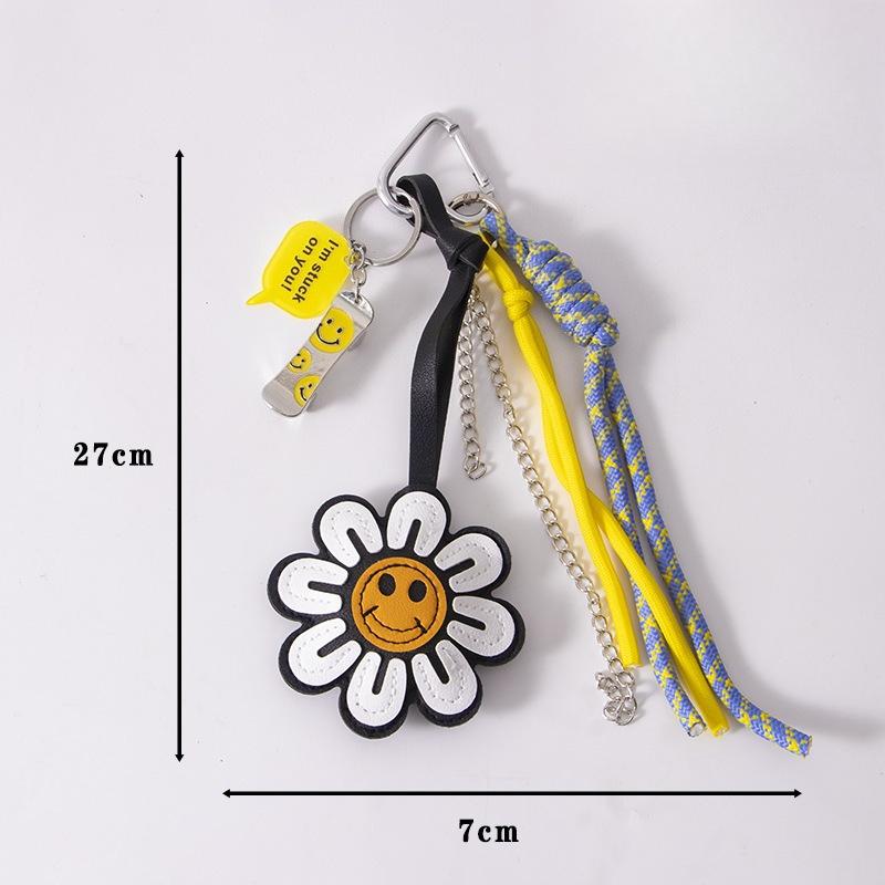 

Кожаный объемный брелок в виде улыбающегося лица и подсолнуха, подвеска для сумки, автомобильный брелок, подвеска в виде цветка