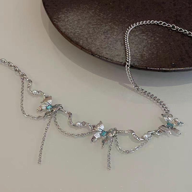 Lake blue liquid butterfly necklace, light luxury, niche design, high-end design, sweater chain, new women's collarbone chain