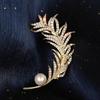 Bo Xin Yun Luxury Korean Zircon Feather Brooch with Freshwater Pearl and Agate.