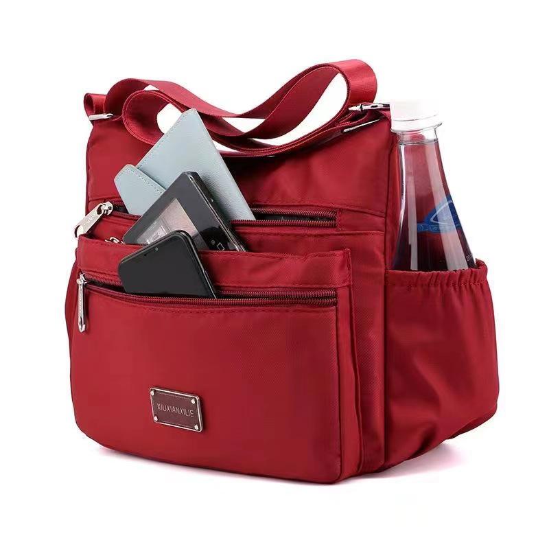 Bolsa de ombro feminina de lona de nylon de grande capacidade: Bolsa de mensageiro com vários compartimentos para mães de meia-idade e idosas