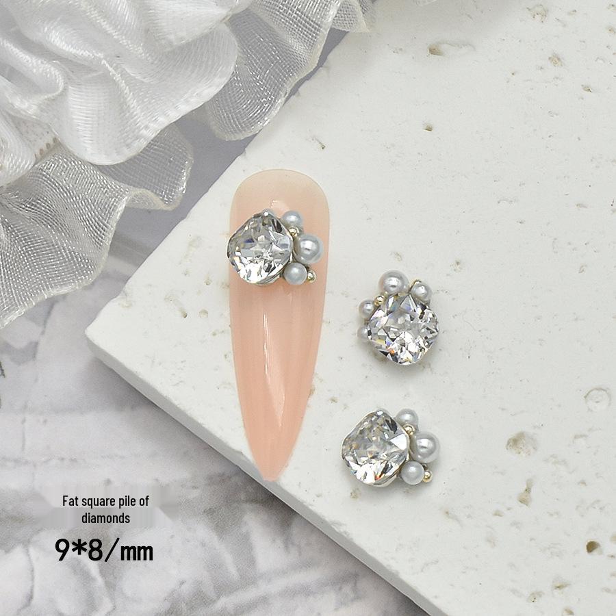 Elegant Nail Art: Pearl & Butterfly Inlaid Pigeon Egg with Zirconia and Rhinestones