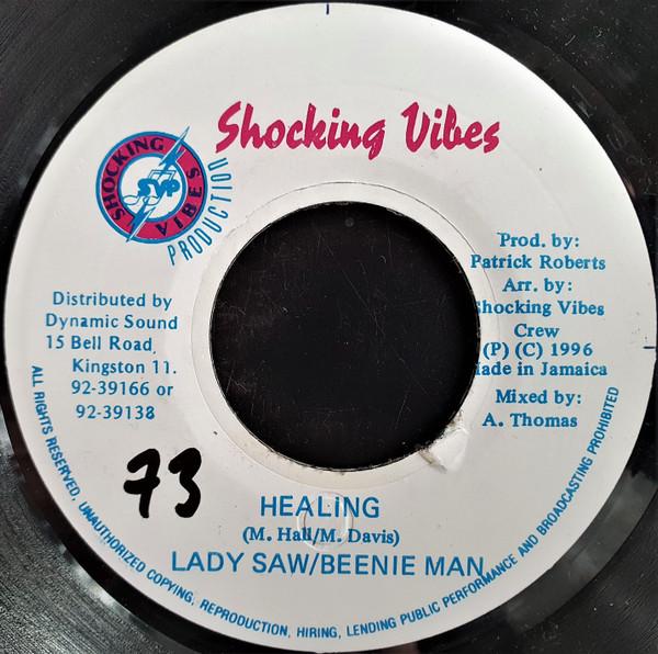 

7-дюймовая пластинка LADY SAW / BEENIE MAN - Healing NONE Shocking Vibes 1996 Ямайка Регги, Ска и Даб Б/У