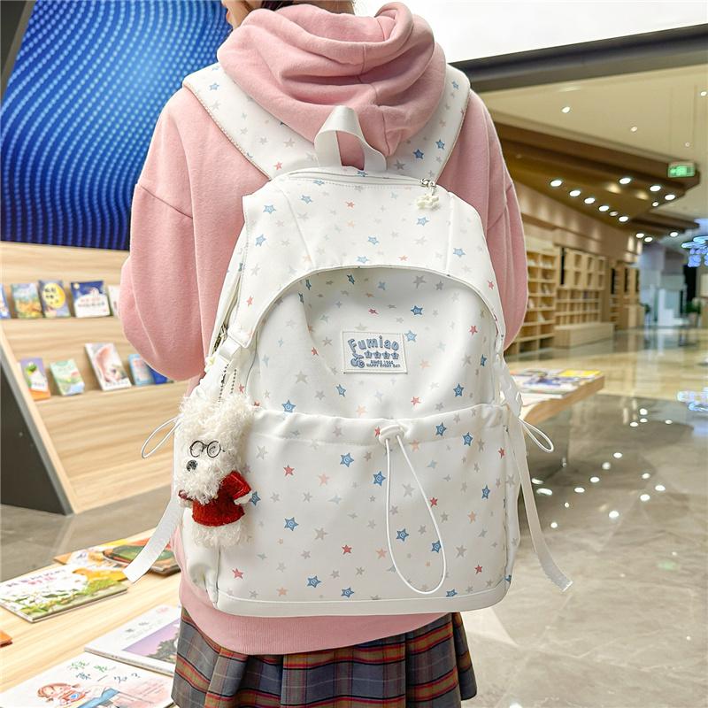 Cute Star Print Nylon Backpack for Women – Fashionable School & Daily Use Bag with Front Drawstring Pocket and Plush Charm