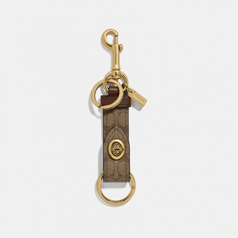 

Подвеска на сумку Coach Trigger Snap из фирменной канвы