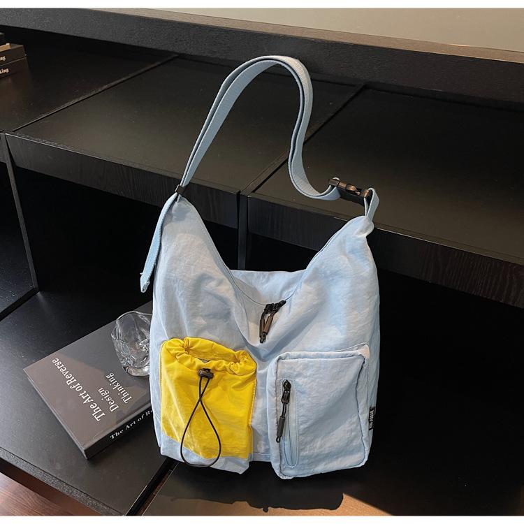 

Повседневная дорожная сумка унисекс тоут новая мода ниша нейлон универсальная большая вместимость плечевая сумка мессенджер женская синий