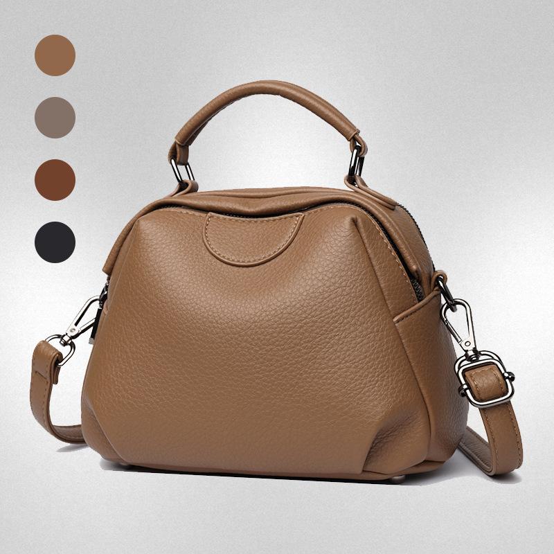 New hand-carried oblique straddle bag large-capacity fashionable and casual retro women's shoulder bag cowhide pattern simple bucket bag