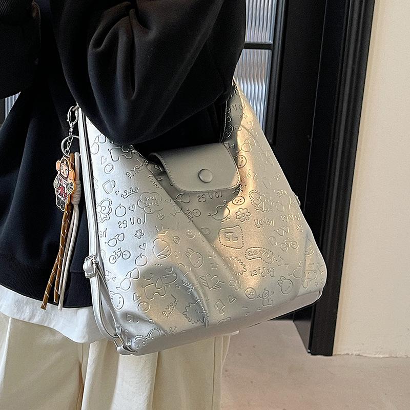 High-quality new niche cute graffiti embossed large-capacity tote bag light casual soft leather multi-back shoulder bag