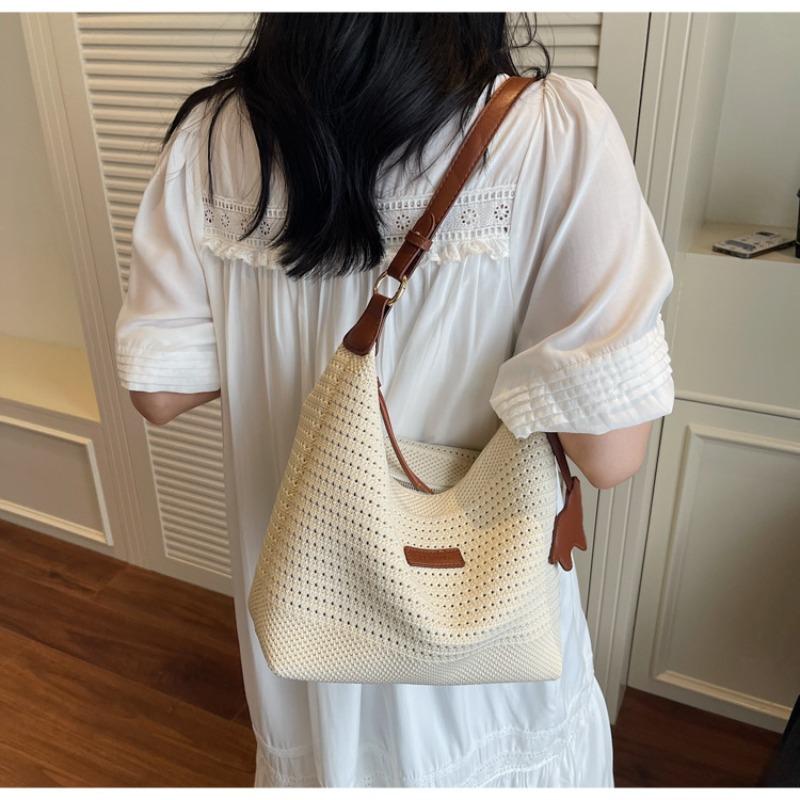 Summer lazy wind large-capacity tote bag women's new niche light luxury hand-woven underarm bag beach bag