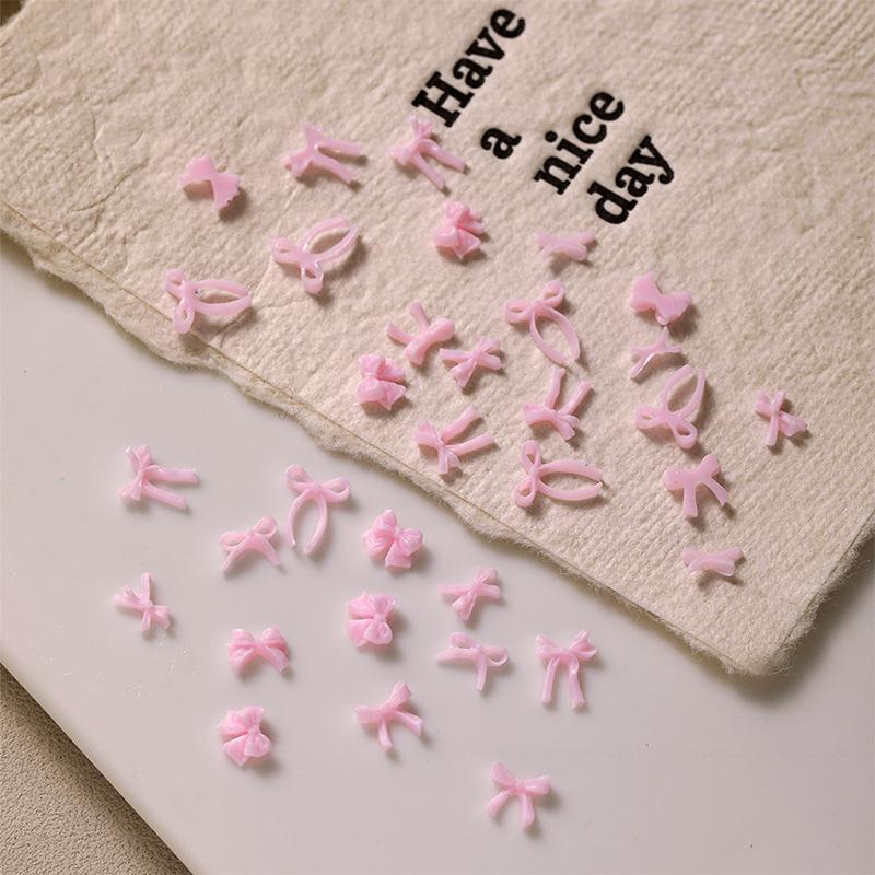 50 Stück Schleife Nagelzubehör 3D Flatback Harz Schleife Nagelanhänger DIY Frühlingsnägel Nailart Dekorationsteile