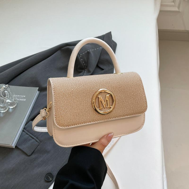 Popularna przenośna mała kwadratowa torba wiosenno-letnia nowa moda retro listowa torba na ramię listonoszka