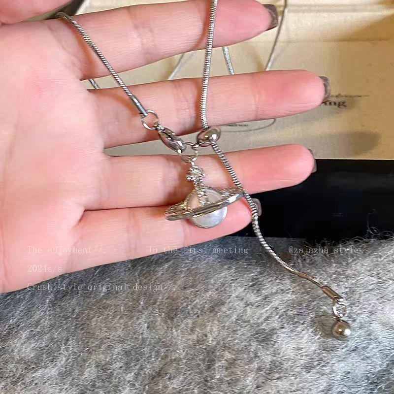 Saturn Pearl Pendant Tassel Necklace - Women's Adjustable Sweater Chain, High-End Autumn/Winter 2025 Collection.