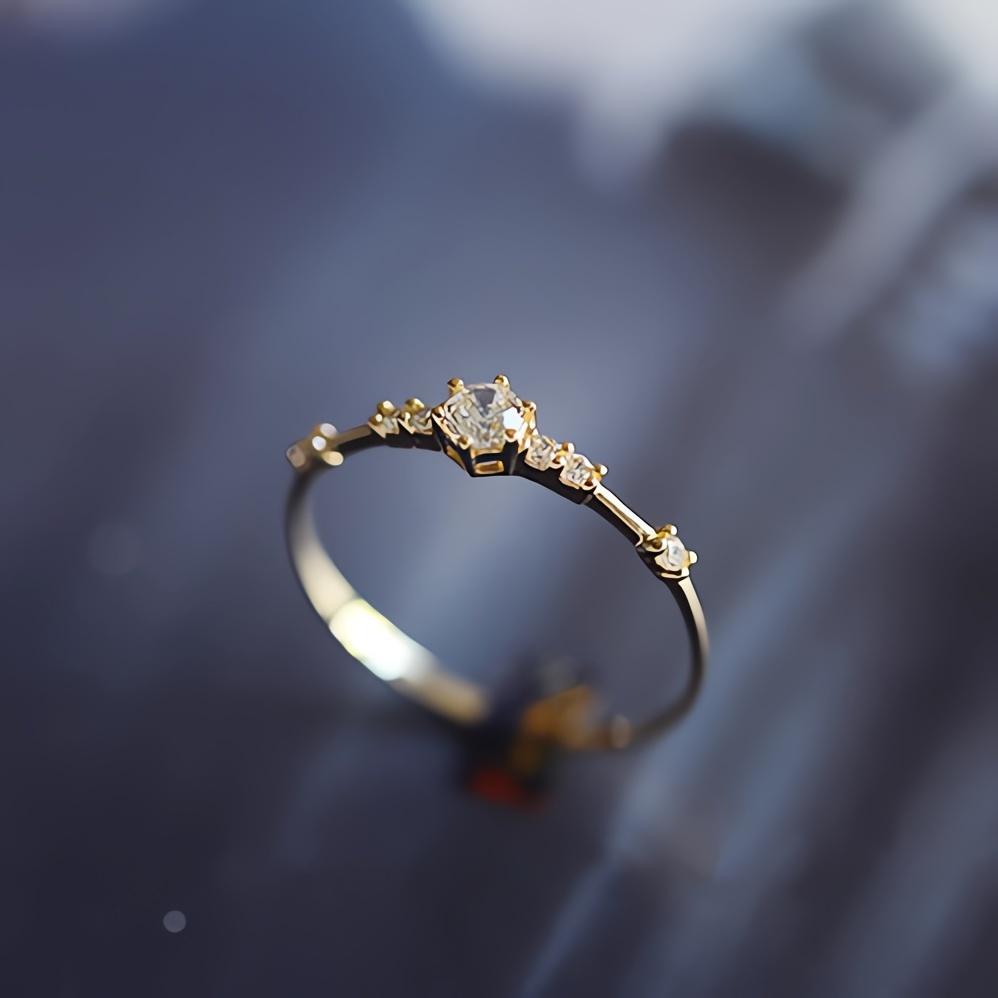 Ring aus 925er Sterlingsilber, 14 Karat vergoldet, mit glänzendem Zirkonia oder Silber. Passen Sie Ihren Look an Alltags- und Partyoutfits an.