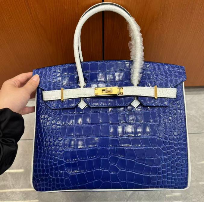 

Новое поступление Натуральная кожа Желтая коровья кожа Нить Коровья кожа Сумка Сумка Женская 2025 Новое поступление Модная Сотня стилей 30 синий/белый