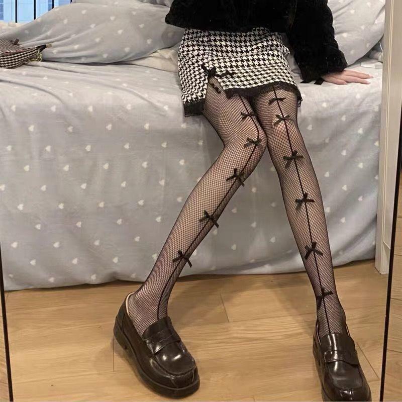 

Black silk bow, black and white hollow fishnet stockings, Japanese-style pure desire couple s sexy pantyhose, thin lace Spot Goods