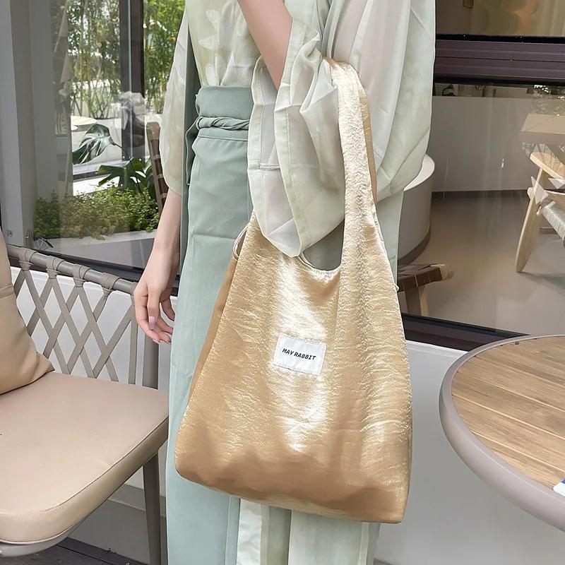 Einfaches Design Damenweste Schultertasche Große Kapazität Perlmuttfarben Damen Einkaufstaschen Pendeln College-Mädchen Buch-Tote Handtaschen