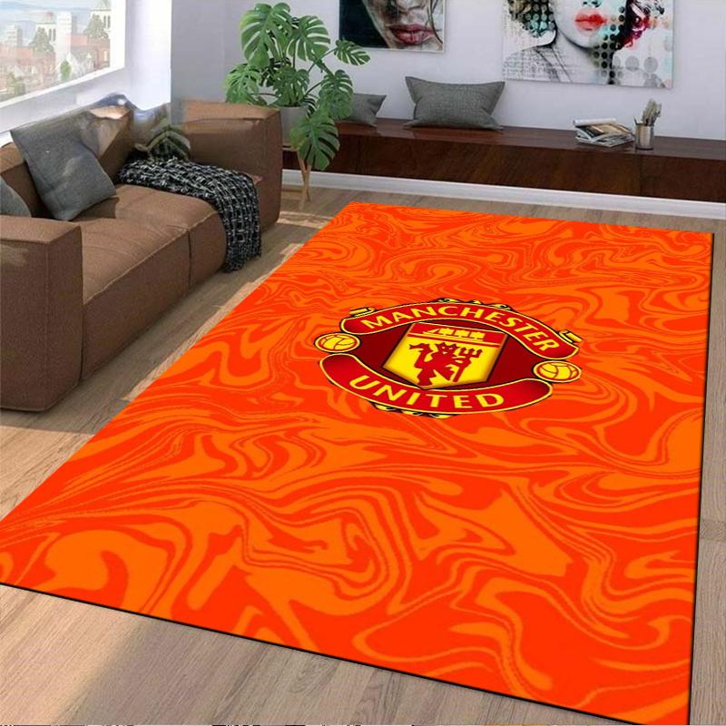 Manchester United Logo Carpet with Bold Orange Swirl Pattern Design Suitable for Use As an Anti-slip for Living Room Bedroom Sofas
