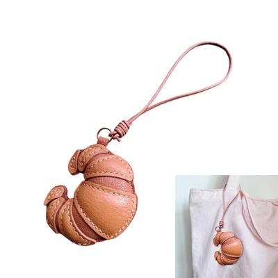 Handmade Leather Croissant Shaped Bag Charm Keychain Accessory for Fashion Enthusiasts Unique Backpack Accessories