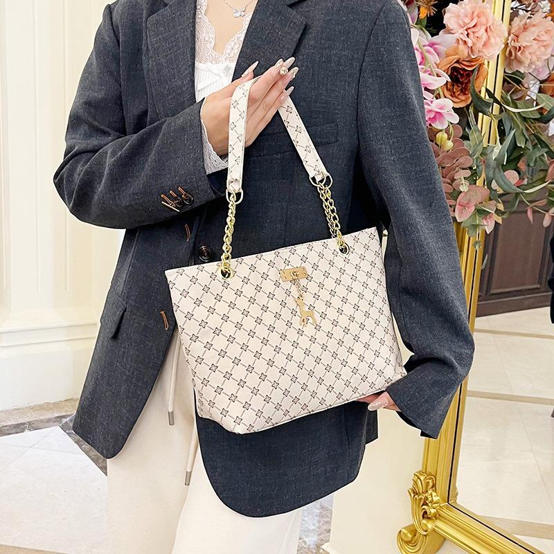 Damentasche neu retro Nische tragbar Persönlichkeit trendig große Kapazität Mode Pendler Schultertasche Tragetasche