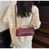 Heiß verkaufte Mode Baguette-Tasche neue Frühling und Sommer Clutch mit hoher Textur Einzelne Schulter Schräg getragene Tasche Damen