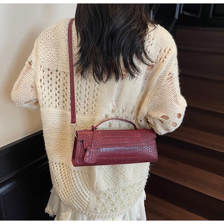 Heiß verkaufte Mode Baguette-Tasche neue Frühling und Sommer Clutch mit hoher Textur Einzelne Schulter Schräg getragene Tasche Damen