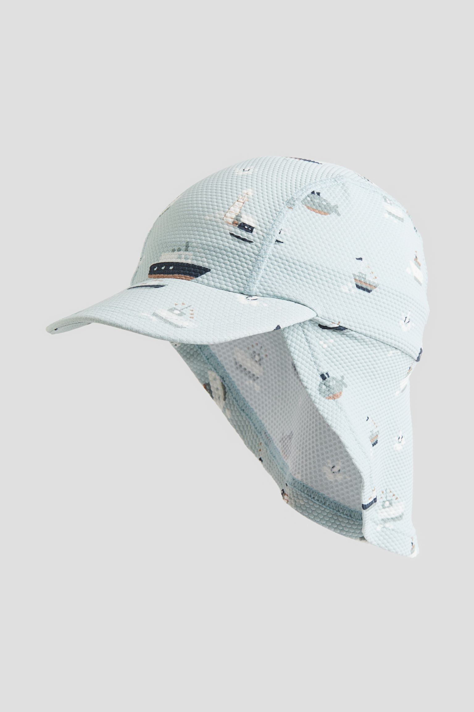 

шапочка для плавания с защитой UPF 50.