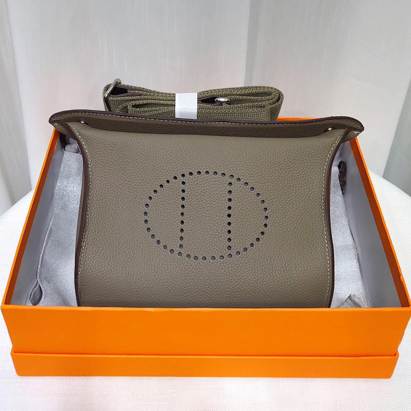 High-end versatile first-layer cowhide bag, dinner plate bag, genuine leather unisex bag, casual shoulder messenger bag.